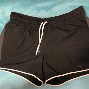 Black, white, and gray Nike shorts